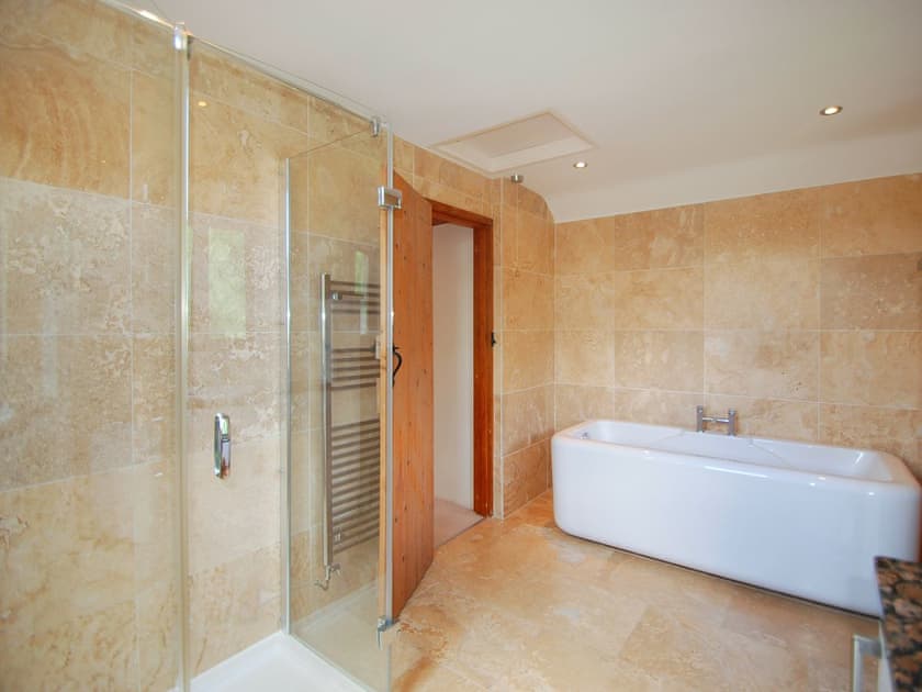 En-suite with bath and shower | Ty Newydd, Llyn Geirionydd, near Llanrwst