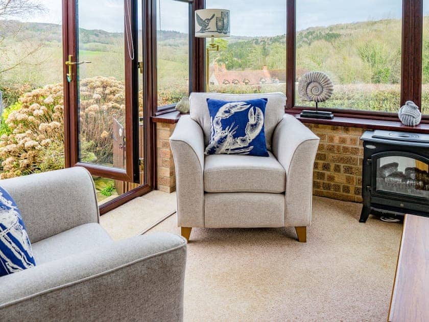 Countryside views from the conservatory | Poirot Cottage - Coppers Cottages, Lyme Regis