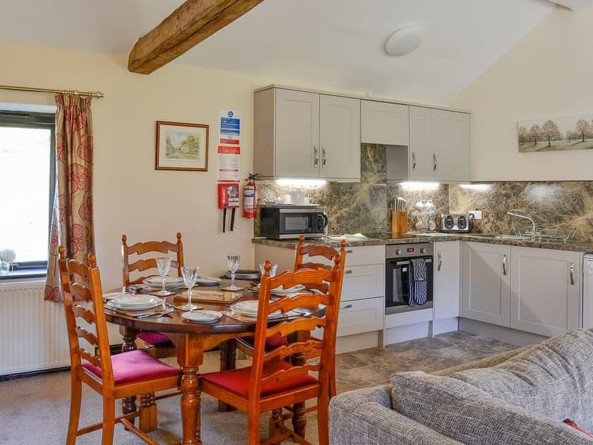 Open plan living space with well equipped kitchen area | Tansy Close - Stonelands Farmyard Cottages, Litton near Kettlewell