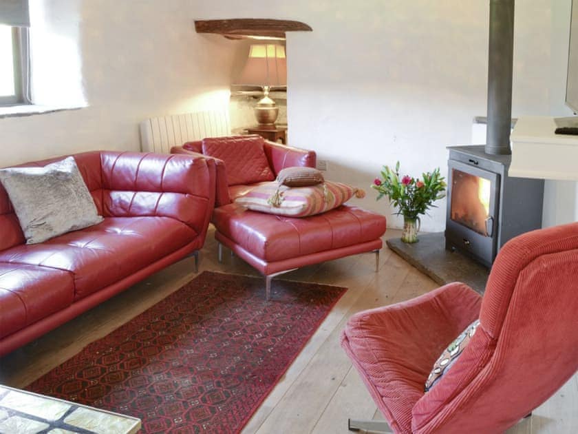 Welcoming living room with wood burner | Mad Nelly Cottage - Wheeldon Farm Cottages, Halwell, near Totnes