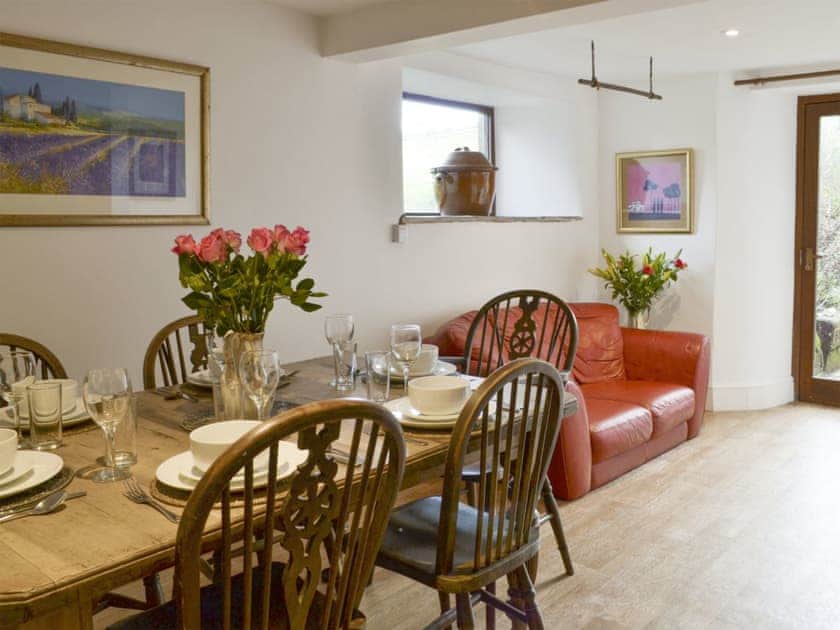 Dining room with additional comfy seating area | Mad Nelly Cottage - Wheeldon Farm Cottages, Halwell, near Totnes