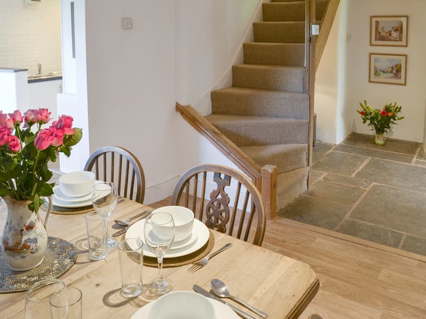 Dining room with open aspect to hallway | Mad Nelly Cottage - Wheeldon Farm Cottages, Halwell, near Totnes