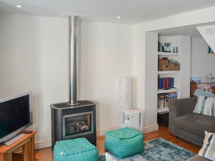 Warm and cosy living area with gas wood burner | Mallams, Portland, near Weymouth