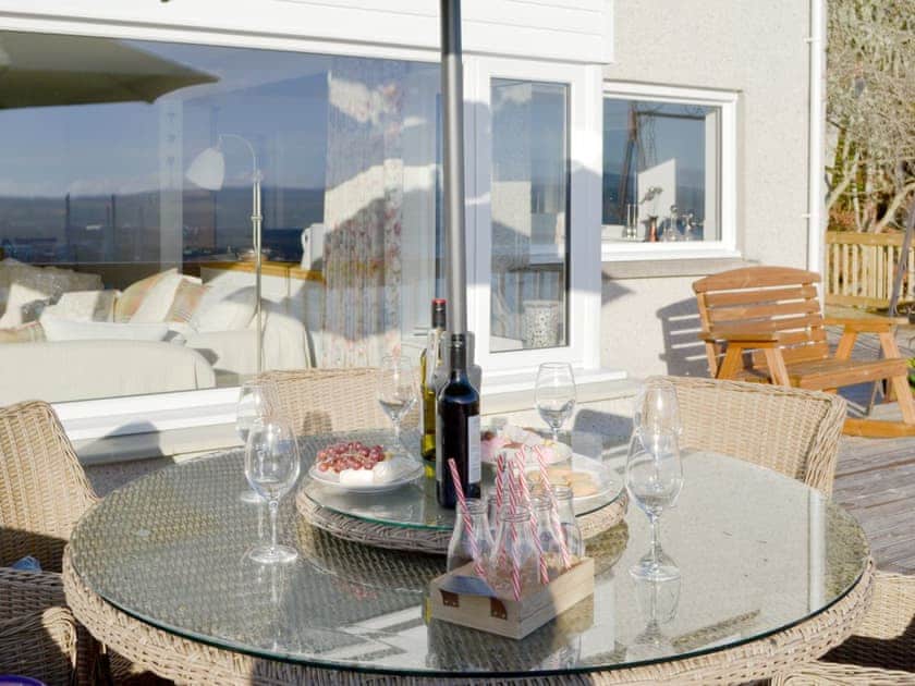 Excellent decking area with dining area | Balnacraig, Craigton, near Inverness