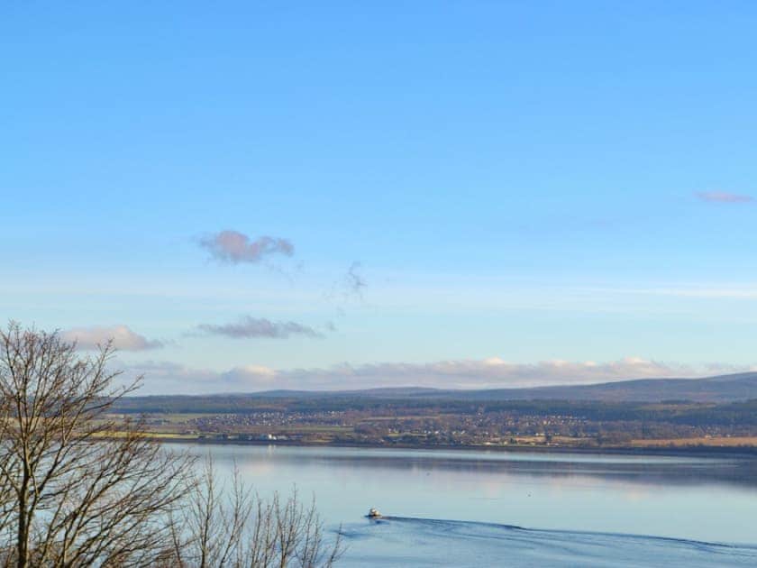 Stunning water views from the decking | Balnacraig, Craigton, near Inverness
