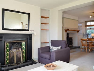 Cosy Living Room With Victorian Style Fireplace And Wood Burner