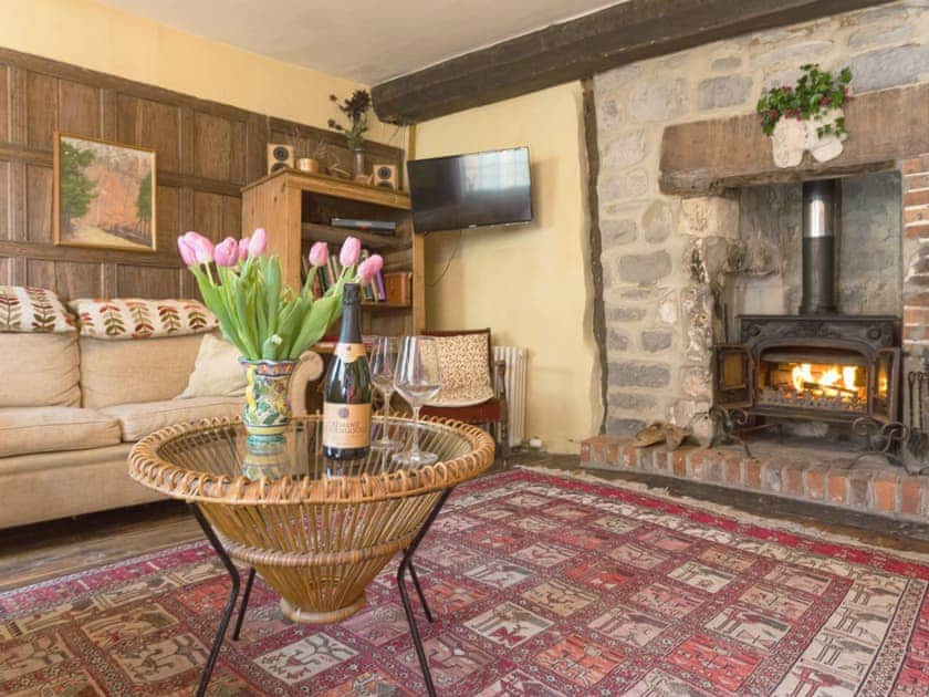 Charcterful living room with cosy wood burner | Fossilers Lodge, Lyme Regis