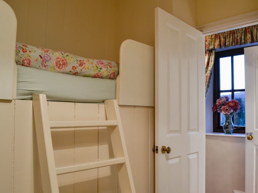 Bedroom with built-in children’s bunk bed | Pear Tree Cottage, Bowness on Windermere