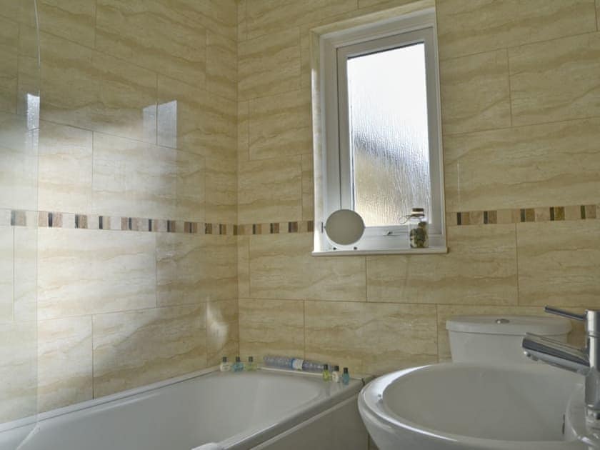 Bathroom with shower over bath | The Meadow Flat, Shanklin