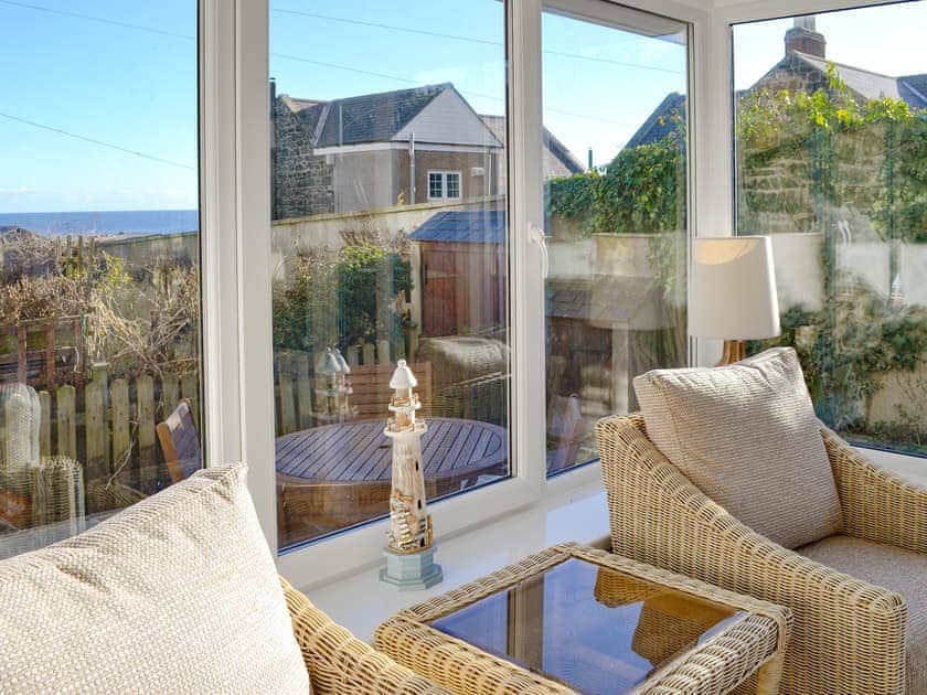 Wonderful sea views from the conservatory | Aidan Cottage, Craster, near Alnwick