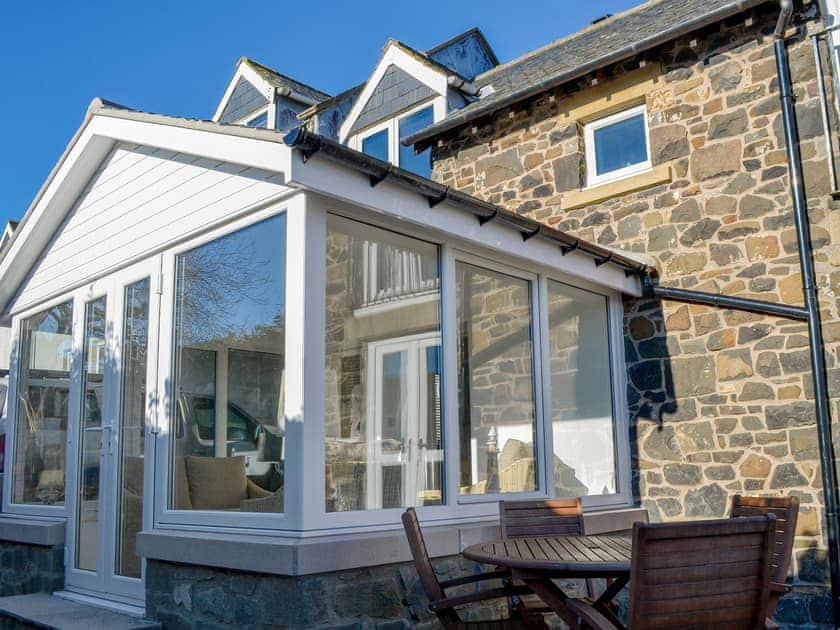 Delightful holiday home with patio area | Aidan Cottage, Craster, near Alnwick