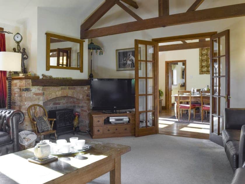 Welcoming living room | Swallow Barn, Warkworth, Banbury