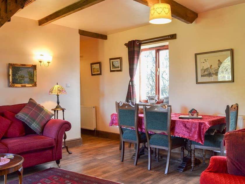 Delightful living area with open staircase to first floor | Acorn Barn, Laytham, near York
