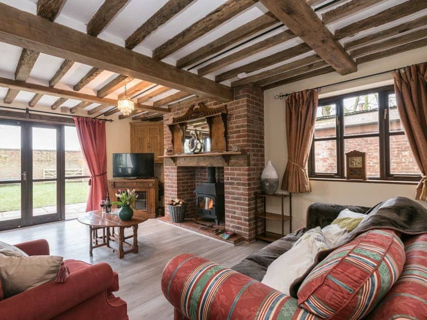 Stylishly furnished living room | The Old Hall Coach House, Tacolneston, near Wymondham 
