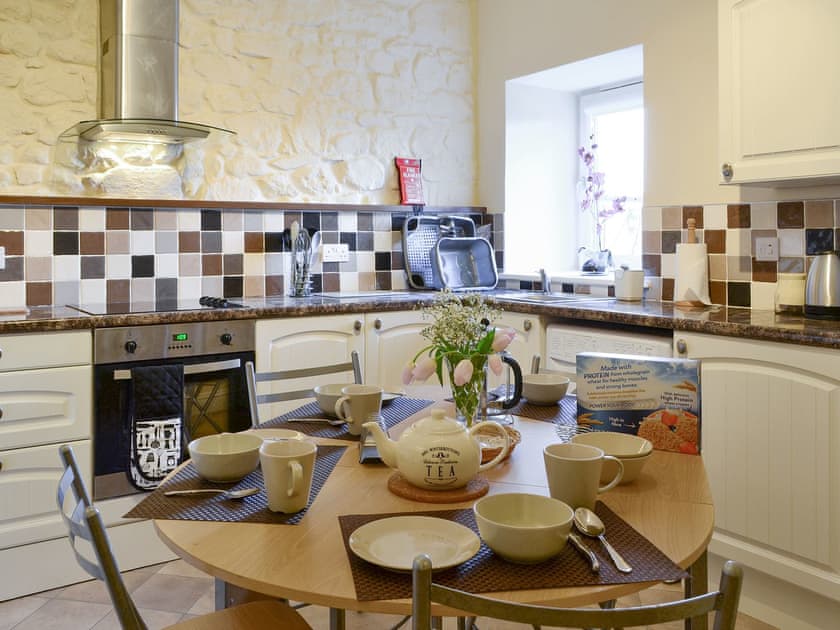 Informal dining area within the kitchen | Cedar Lodge - Rousland Cottages, Linlithgow