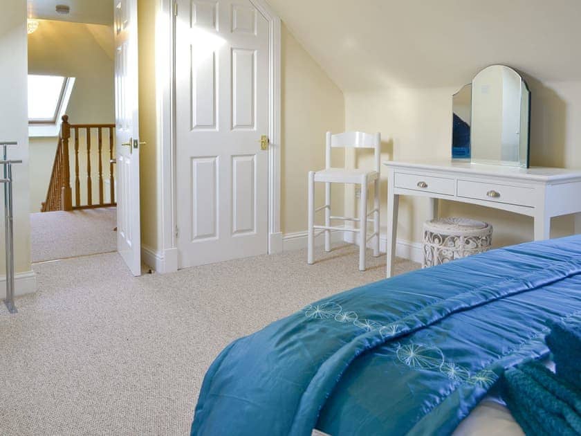 Dressing area within the master bedroom | Cedar Lodge - Rousland Cottages, Linlithgow