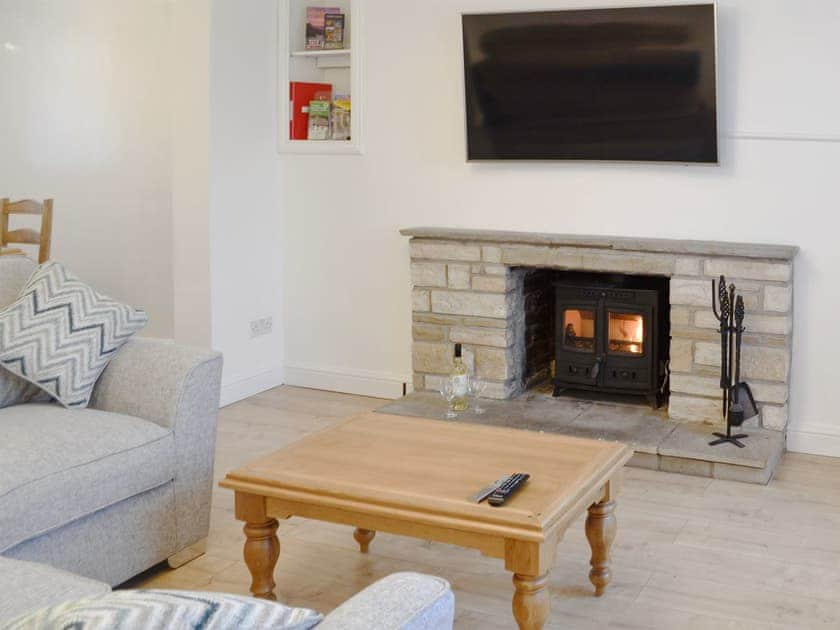 Comfortable living room area | Ty Bryn Cottage, Kenfig Hill, near Bridgend