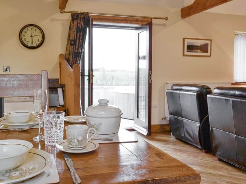 Light and airy dining space | The Old Byre - West House Farm, Dearham, near Maryport
