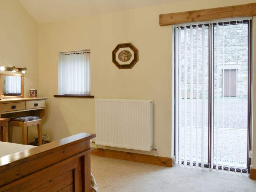 Spacious double bedroom | The Old Byre - West House Farm, Dearham, near Maryport