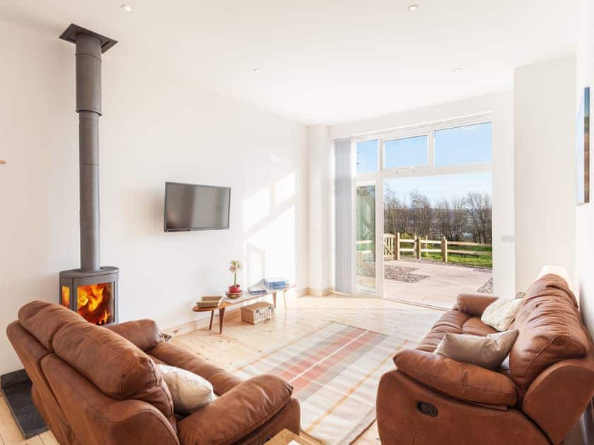 Contemporary yet warm living area | The Red Barn, Braunton, near Barnstaple