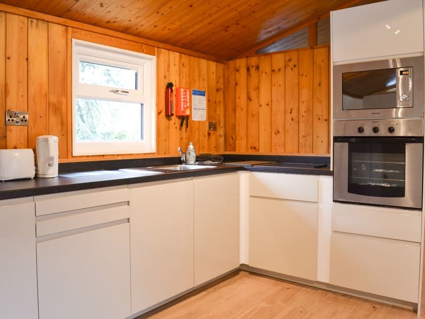 Well fitted kitchen area with all appliances | Cedar Lodge, Charlcot, near Masham