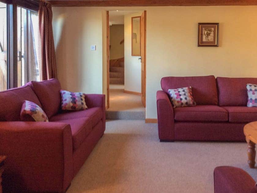 Living room with comfortable sofas | The Pump House, Hawkesbury Upton