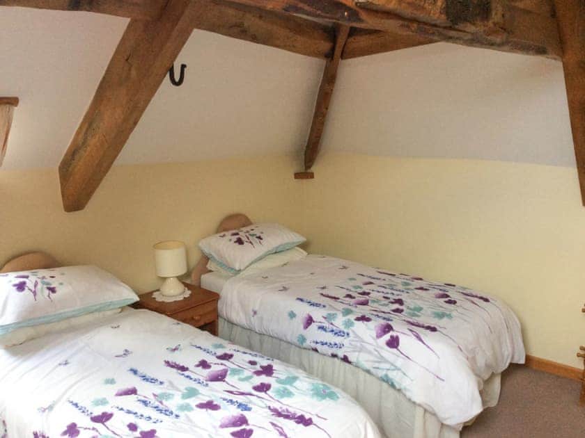 Beamed twin bedroom | The Pump House, Hawkesbury Upton