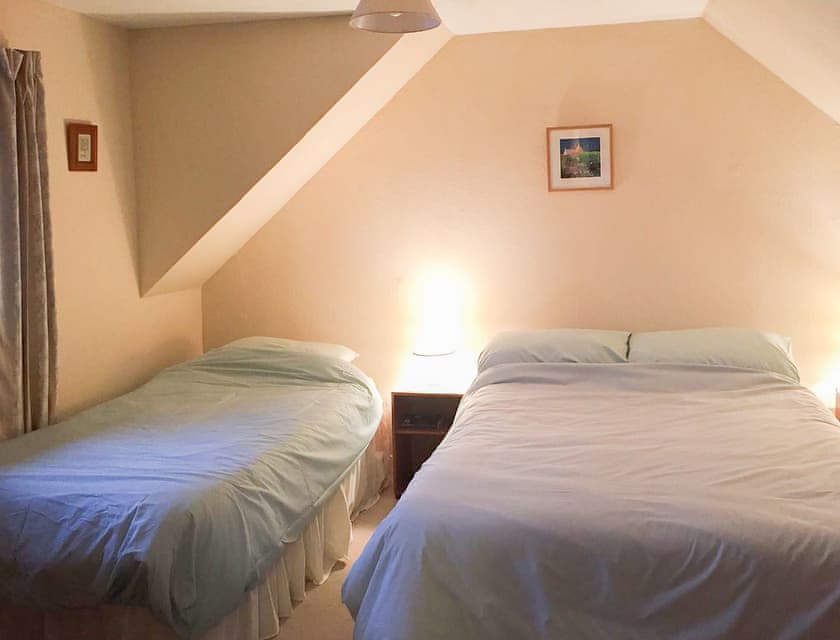 Family bedroom comprising a double and single beds | Tigh Mairi, Carragrich, near Tarbert, Isle of Harris