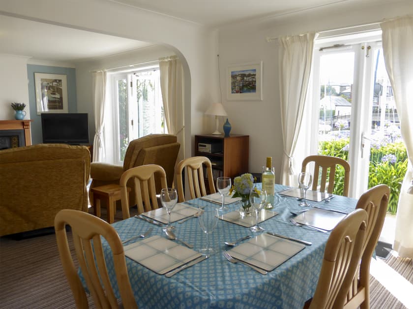 Living/dining room with patio doors | Spinnakers, Falmouth