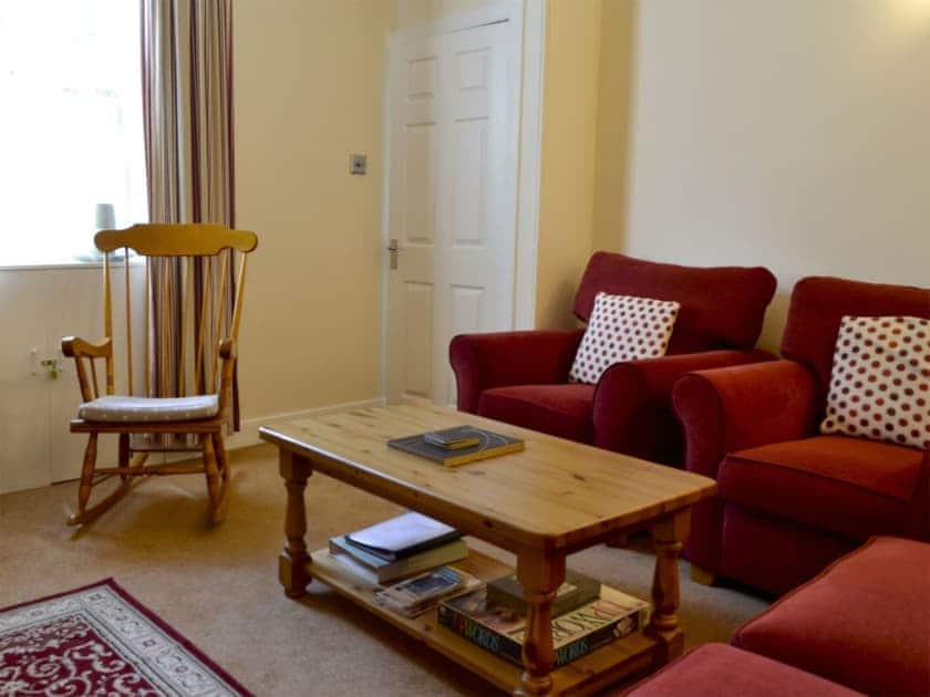 Cosy living room with multi-fuel burner | Kirsty Cottage, Moffat