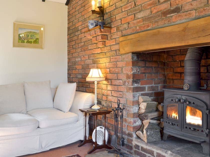 Charming living room with cosy wood burner | The Secret Cottage, Cromford, near Matlock