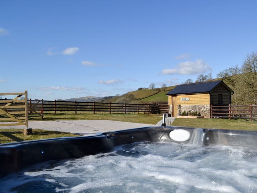 Private hot tub for 6 | Maes Merlin, Llanddeusant, near Llangadog