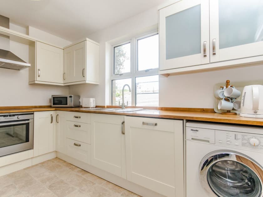 Well-equipped kitchen | Coastguard Cottage, Sandown