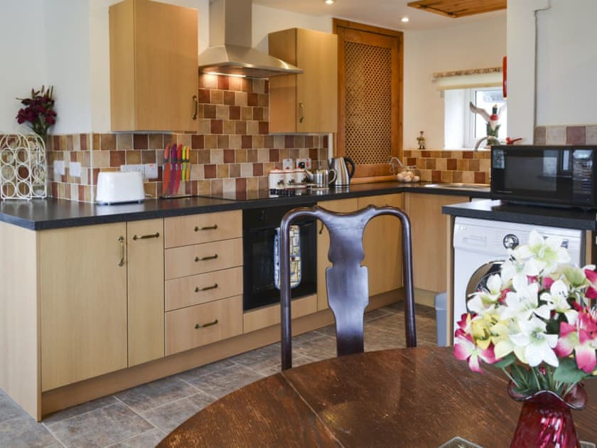 Kitchen with breakfast area | Knotty Corner Cottage, Fairy Cross, near Bideford