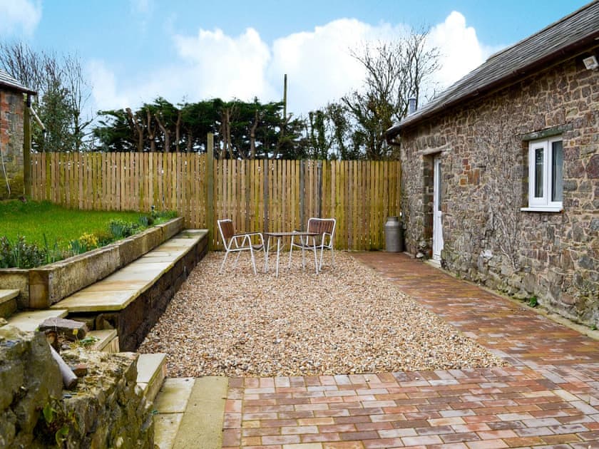 Patio with garden furniture | Knotty Corner Cottage, Fairy Cross, near Bideford