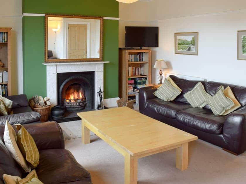 Charming living room with cosy open fire | Esk View - Captains Row, Whitby