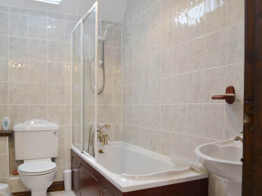 Family bathroom with shower over bath | The Stables - West Bridge End, Frosterley, near Bishop Auckland