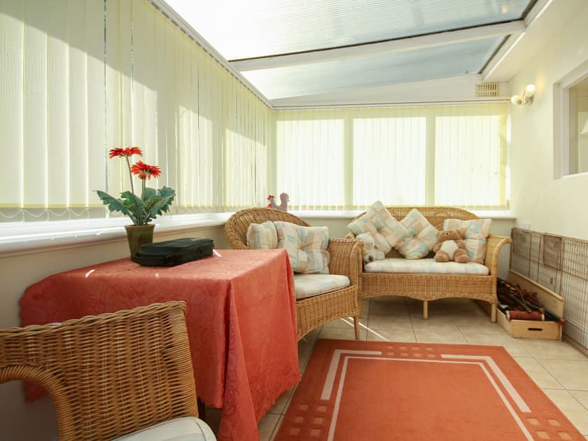 Sunny conservatory | Woodside Cottage, Sandford, near Shanklin