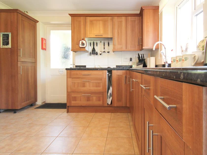Spacious kitchen with tiled floor | Woodside Cottage, Sandford, near Shanklin