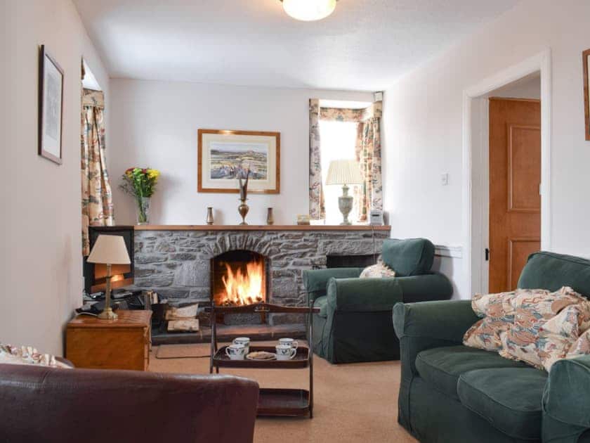 Cosy living room with open fire | Castle Peroch - Kinnaird Estate Cottages, By Dunkeld, Pitlochry