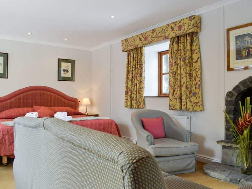 Large double bedroom with seating area | Jock Scott Cottage - Kinnaird Estate Cottages, By Dunkeld, Pitlochry