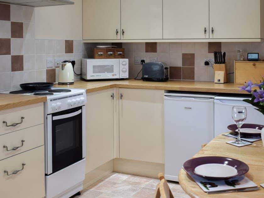 Lovely fitted and part-tiled kitchen | Sycamore Cottage, Borrowby, near Staithes