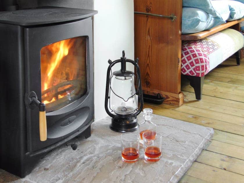 Warm and cosy wood burner in living room | The Lucken, Auchmithie near Arbroath