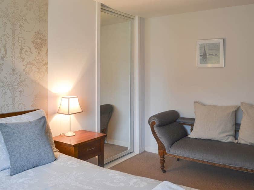Double bedroom with additional seating | Loramore, Aviemore