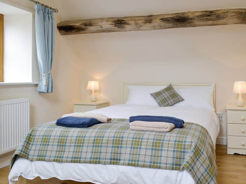Family bedroom with a king-size and a single bed | No. 2 Ash Cottage - Six Ash Cottages, Six Ashes, near Bridgnorth