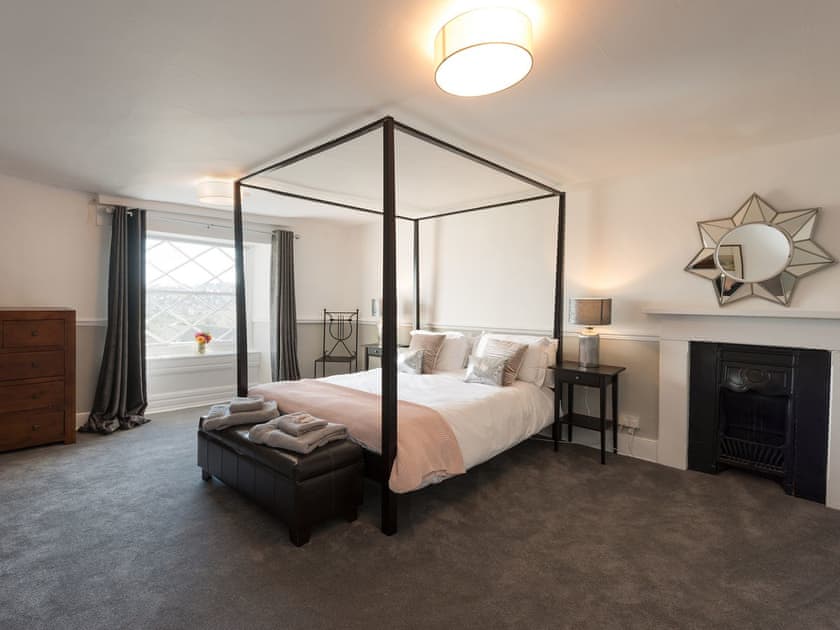 Four poster bedroom | Newton Manor House, Swanage, Isle of Purbeck