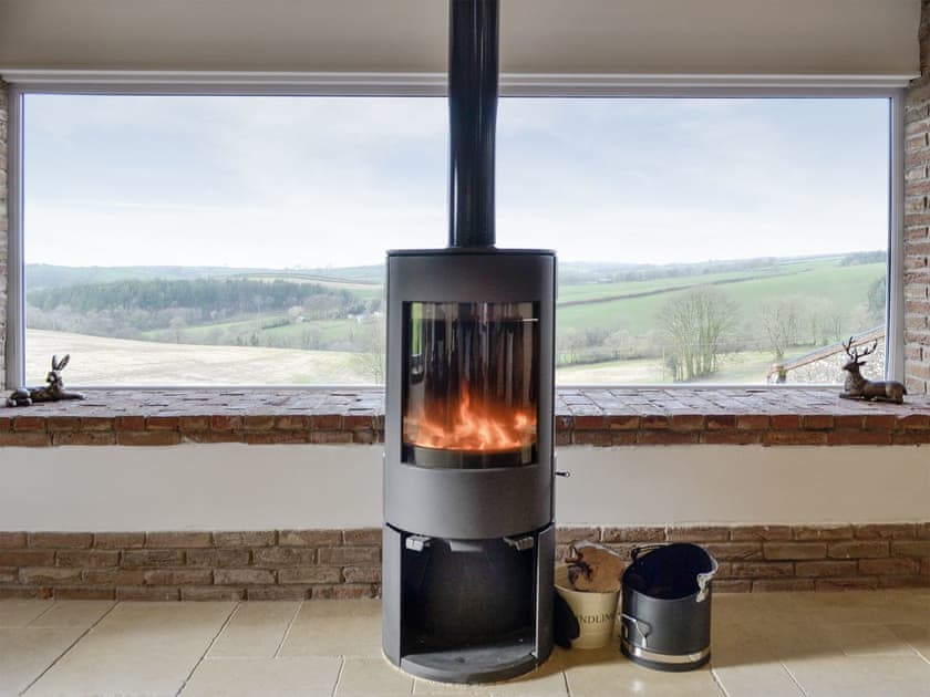 Contemporary multi-fuel burner and amazing rural views | Combe View - Lower North Radworthy Cottages, Heasley Mill, near South Molton