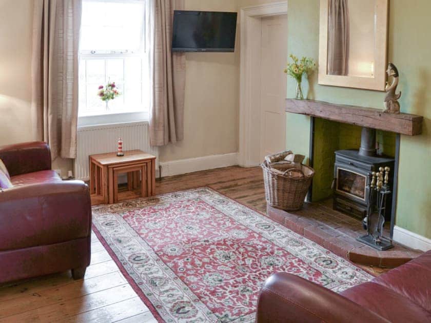 Welcoming living room with wood burner | Lighthouse Cottage, Happisburgh, near Cromer