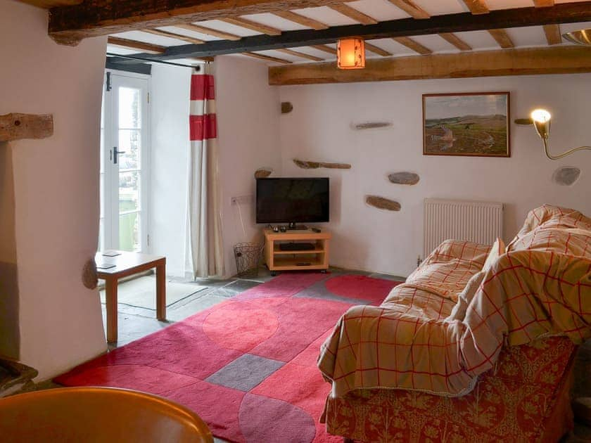 Lovely beamed living/dining room | Meadwell - Trebarwith Farm Cottages, Trebarwith, Delabole