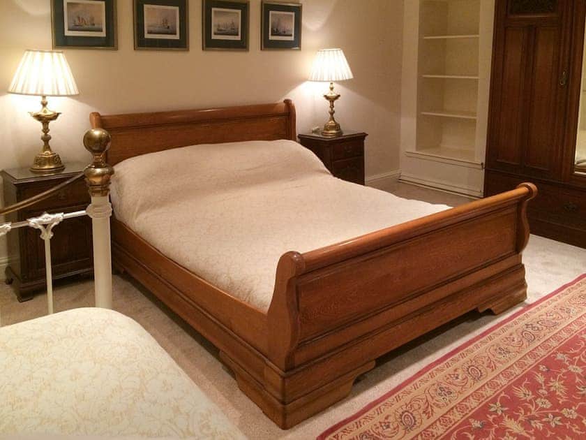 Comfortable family bedroom with a double and a single bed | Inglenook Cottage, Kettlewell, near Grassington